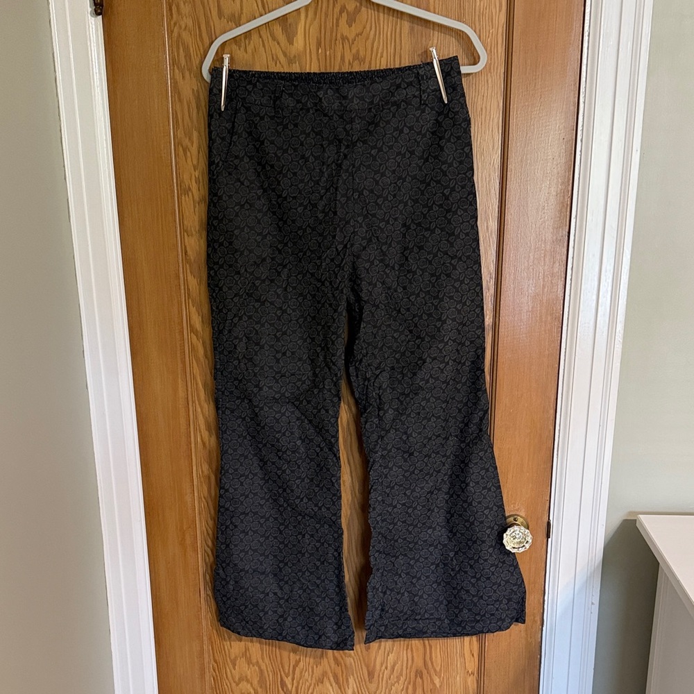 Black corduroy pants with flower design